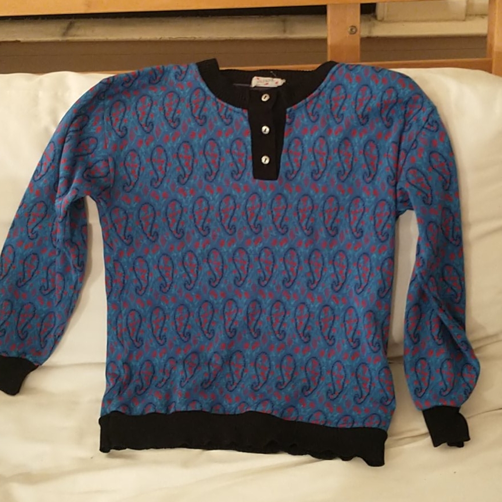 Blue and red paisley sweater with black trim